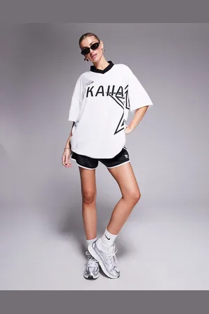Kaiia – Sport – Oversize-Fußballtrikot in und Schwarz mit Sternen-Logo
