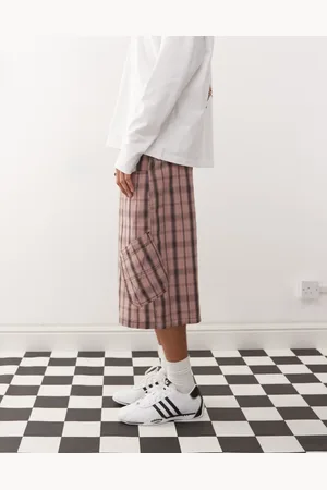 COLLUSION – Weite Longline-Jorts in kariert