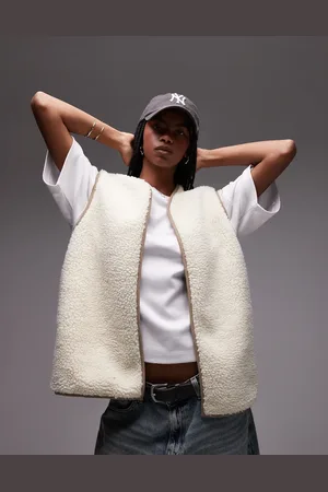 Topshop – Wendeweste in Ecru mit Teddyfell zum Überziehen