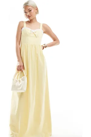 The Frolic – Exklusives Maxikleid in mit Herzausschnitt, farblich abgesetzter Rüschenborte und Schleifendetail