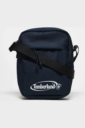 Timberland – Bedruckte Umhängetasche in dunklem Saphirweiß