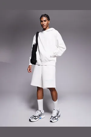 Hugo Blue – Locker geschnittene Jersey-Shorts in Steingrau mit blauem Logo, Kombiteil