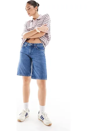 Monki – Imoo – Jeans-Jorts in mittelblauer Waschung mit niedrigem Bund
