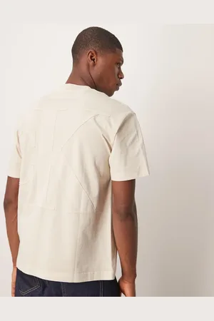 Calvin Klein – Weites T-Shirt in Sandbeige mit farblich abgestimmter Logo-Applikation