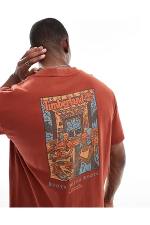Timberland – Verwaschenes T-Shirt in gebranntem Hennarot mit „Boots“- und „Labor“-Rückenprint