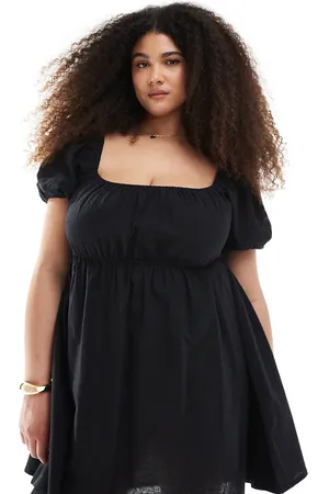 Esmée Esmée Curve – Exklusives Strand-Minikleid in mit Puffärmeln und Bindedetail vorne