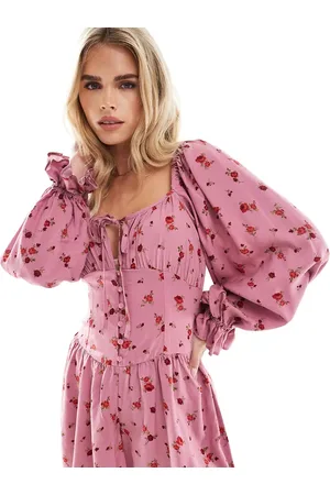 Miss Selfridge – Langärmliger Playsuit in Rosa mit Blümchenmuster