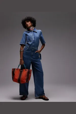 MANGO – Kurzärmliger Oversize-Jumpsuit in Hellblau mit Gürtel