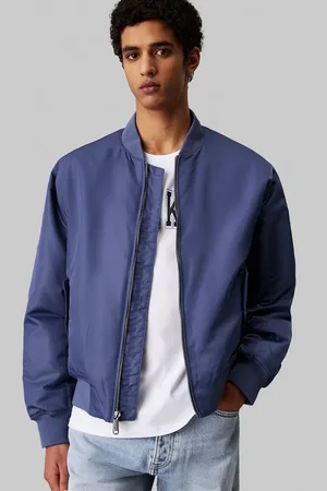 Calvin Klein – Nylon-Bomberjacke in Vintage-Indigo