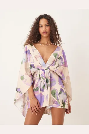 ASOS – Playsuit mit abstraktem Blumenmuster und extrem akzentuierten Ärmeln