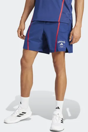 adidas – Designed for Training – Shorts in Dunkelblau und Kalkweiß