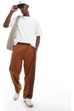 Pull&Bear – Jogginghose in Dunkel- mit weitem Bein und seitlichen Streifen