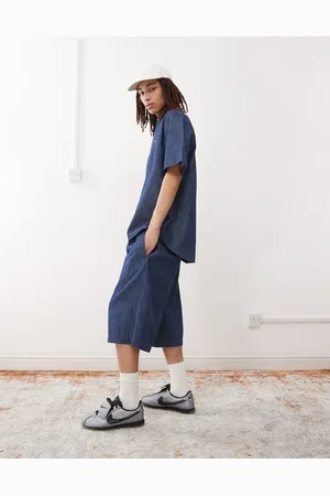 Reclaimed – Weit geschnittene Shorts aus Denim-Chambray in Mittelblau, Kombiteil