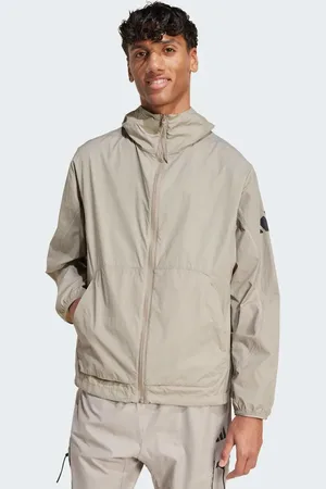 adidas – City Escape – Windjacke in Kittbeige
