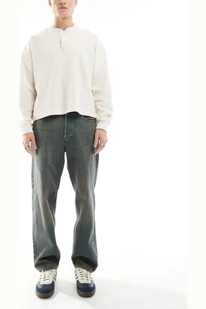 JACK & JONES – Eddie – Lässig geschnittene Jeans in einer Waschung mit Braunstich