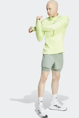 adidas – Ultimate Running – Reflektierende 2-in-1-Shorts in Silbergrün