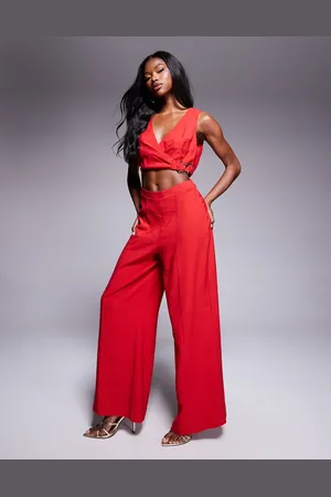 ASOS – Jumpsuit in mit Wickeldesign vorne, Zierausschnitt und Schnallendetail