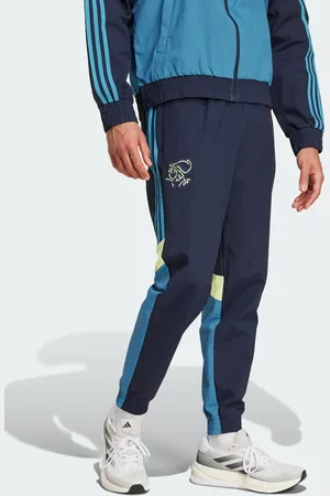 adidas – Ajax Amsterdam Seasonal – Trainingshose in Legend Ink