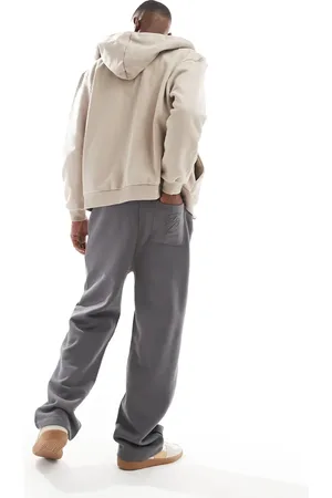 ASOS – Premium – Jogginghose in Anthrazit mit erhöhtem Print und weitem Bein