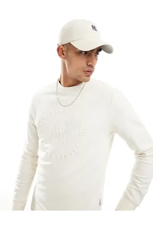 SCALPERS – Pullover in Wollweiß mit Totenkopfprägung