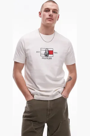 Tommy Hilfiger – T-Shirt in Wollweiß mit mittigem Flag-Logo