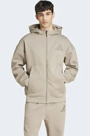 adidas – Z.N.E. – Trainingsjacke in Kittbeige mit Reißverschluss und Kapuze