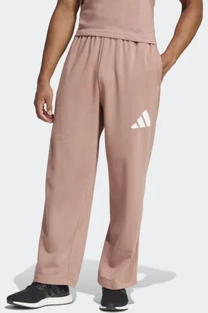 adidas – Essentials – Weit geschnittene Hose in warmer Lehm / Weiß mit 3-Balken-Logo