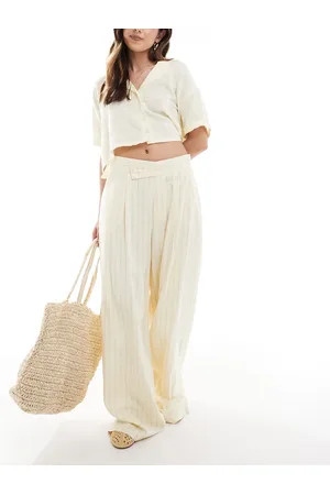 Stradivarius – Elegante Hose in Blassgelb mit Bundfalten, Nadelstreifen und weitem Bein
