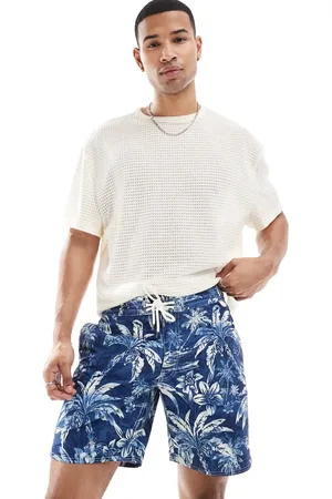 Ralph Lauren – Lange Badeshorts in Mittelblau mit Markenlogo und Palmen-Insel-Schattenprint