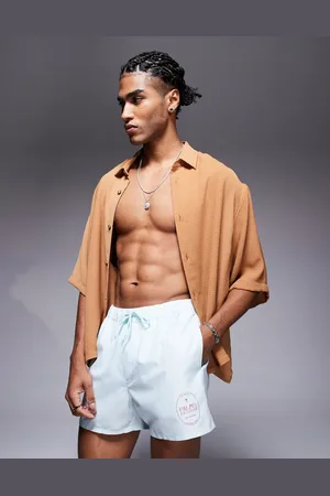ASOS – Kurze, gestreifte Badeshorts in und Weiß