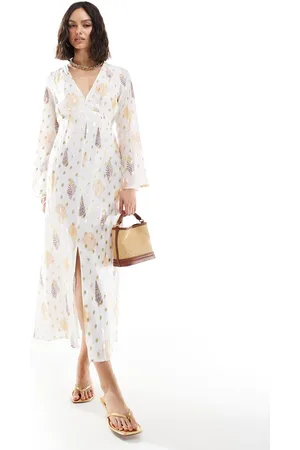 Never Fully Dressed – Maxikleid in Creme mit Ballonärmeln
