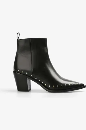 SCALPERS – Mit Nieten besetzte Vintage-Stiefel in