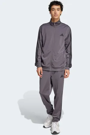 adidas – Sportswear – Basic-Trainingsanzug aus Trikot-Stoff in Grey Strata mit den drei Streifen