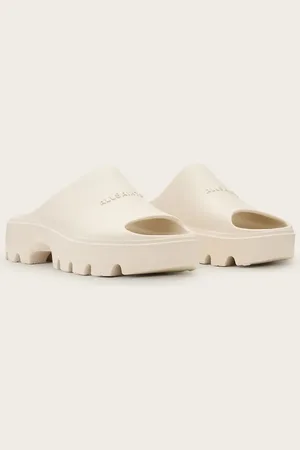 AllSaints – Eclipse – Sandalen aus Gummi in mit Plateausohle