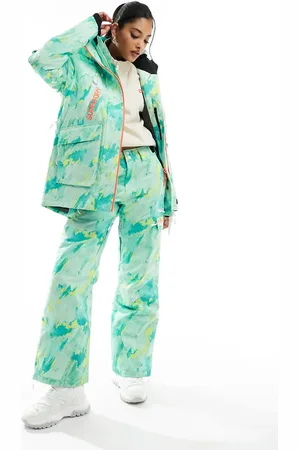 Superdry – Ultimate Rescue – Skihose mit abstraktem Muster in Blau- und Limettengrün