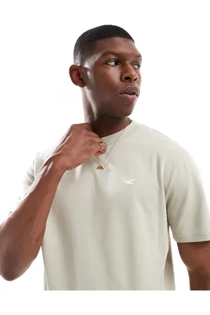 Hollister – Cooling – Kastiges T-Shirt in Hellgrün mit Markenlogo