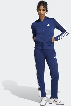 adidas – Essentials – Trainingsanzug in Dunkelblau mit den drei Streifen
