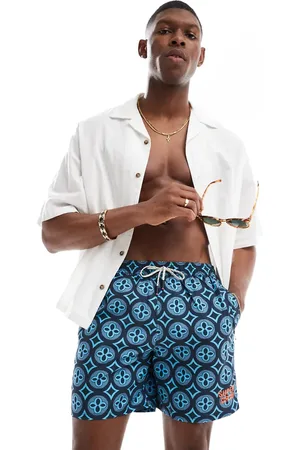Superdry – Badeshorts in Talavera Tile Blue mit Fliesenmuster, 17 Zoll Schrittlänge