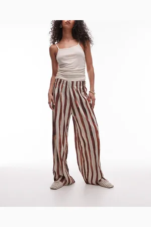 Topshop – Weit geschnittene Hose in gestreift mit Knitterstruktur