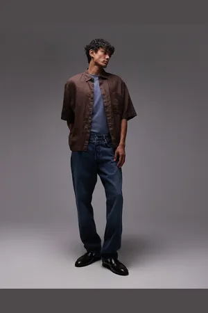 ARKET – Mist – Baggy Jeans in blauer Waschung mit leichtem Age-Effekt, mit niedrigem Bund und weitem Bein