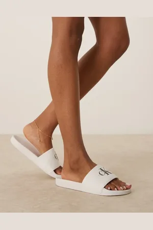 Calvin Klein – Slider in und Schwarz mit Monogramm