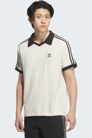 adidas – T-Shirt in Wunderweiß mit Polokragen und Waffelstruktur