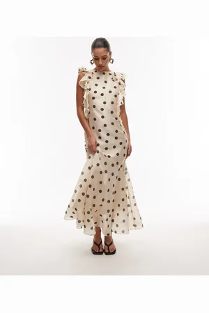 & OTHER STORIES – Gepunktetes Maxikleid mit Rüschensäumen und tiefem Rücken