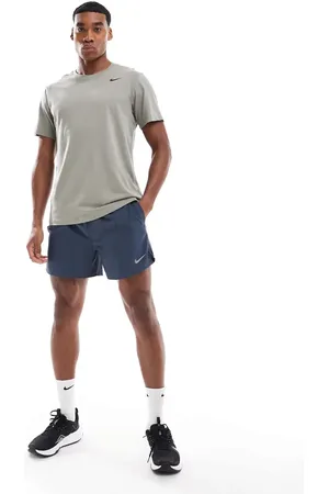 Nike – Challenger Dri-FIT – Shorts in Marineblau, 5 Zoll