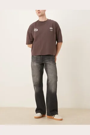 ASOS – Weite Schlagjeans in verwaschenem Vintage