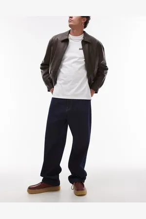 Carhartt – Landon – Schmal zulaufende Jeans in Dunkelblau mit lockerem Schnitt