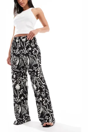 VERO MODA – Plissee-Hose mit hohem Bund, weitem Bein und tropischem Muster