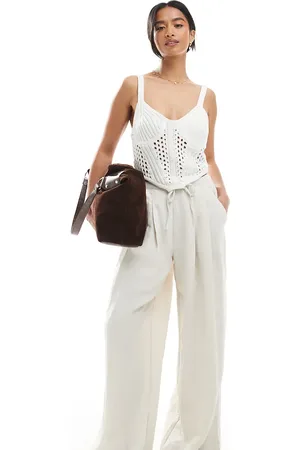 Stradivarius Petite – Schlupfhose in Beige mit weitem Bein