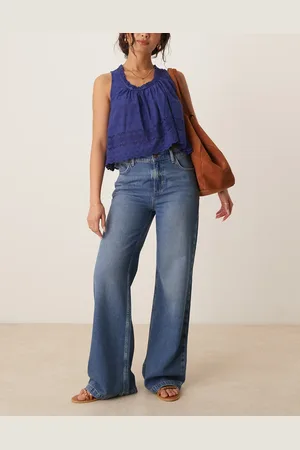 Free People – Stride – Jeans in mittelblauer Waschung mit geradem Schnitt und weitem Bein