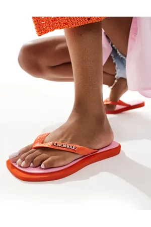 Havaianas – Zehenstegsandalen in und Orange mit eckiger Zehenpartie